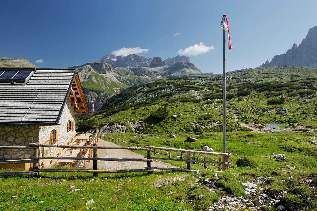 Langalm Hut with flag, South Tyrol, Dolomites, Italy