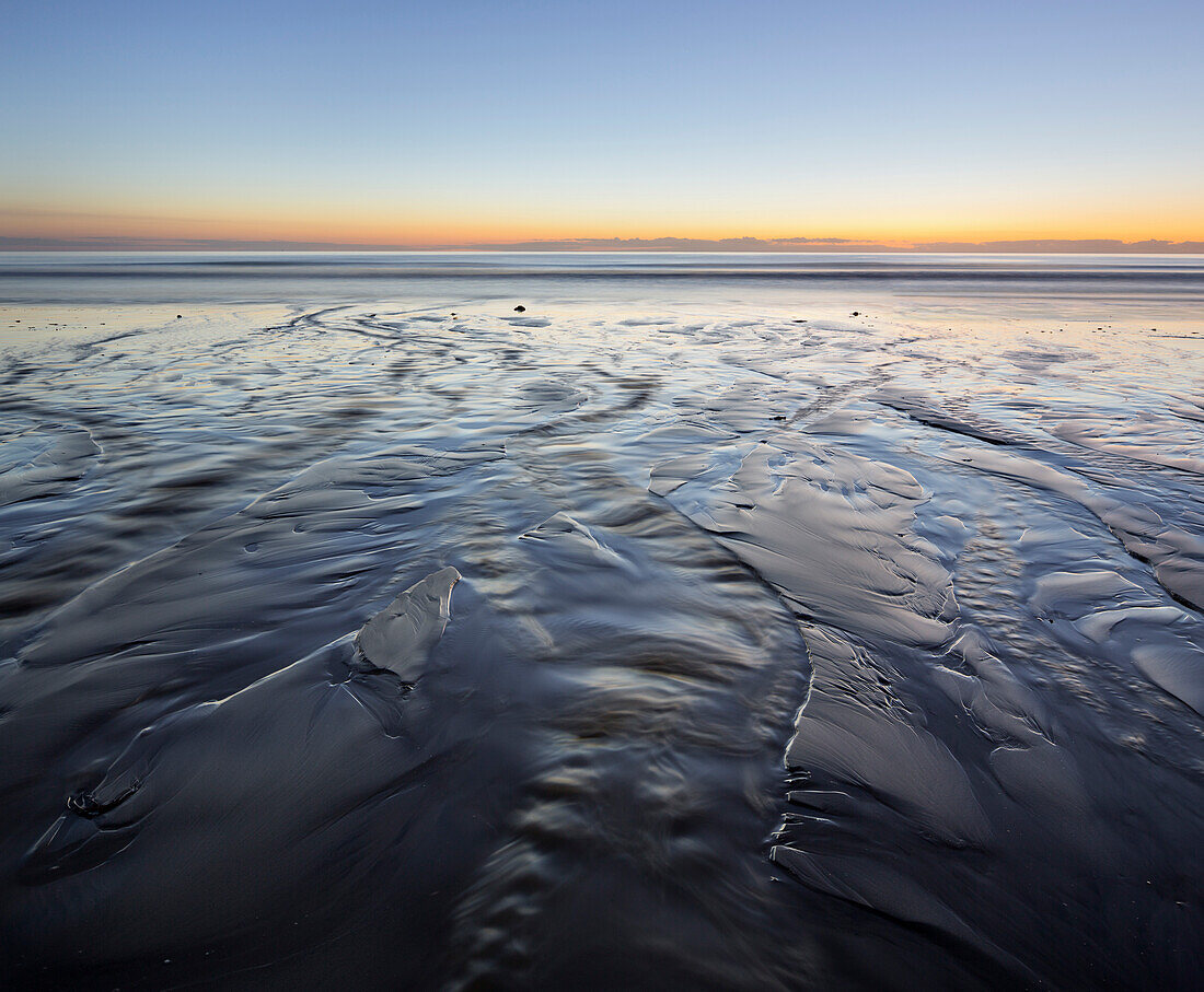 Coastal landscape in the morning light at Moeraki Boulders, Otago, South Island, New Zealand