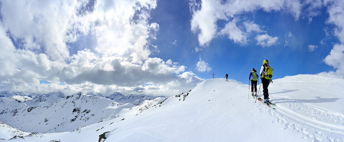 Two female back-country skiers ascending to Schafsiedel, Kitzbuehel Alps, Tyrol, Austria