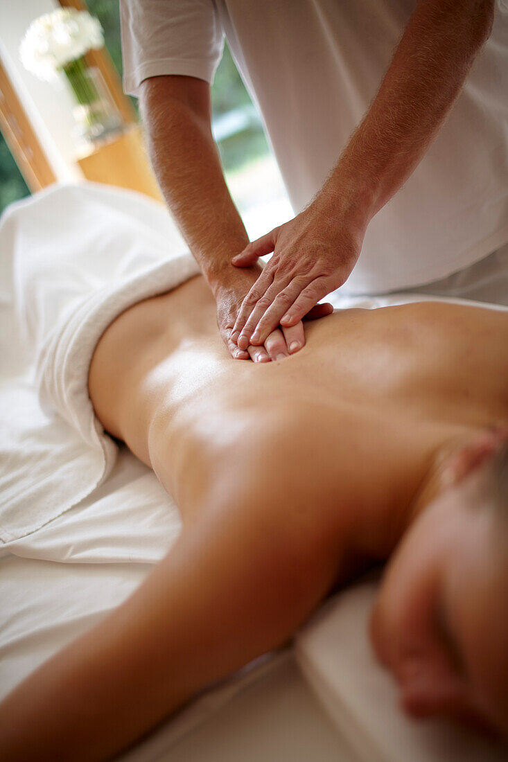 Woman enjoying a massage, Klais, Krun, Upper Bavaria, Germany