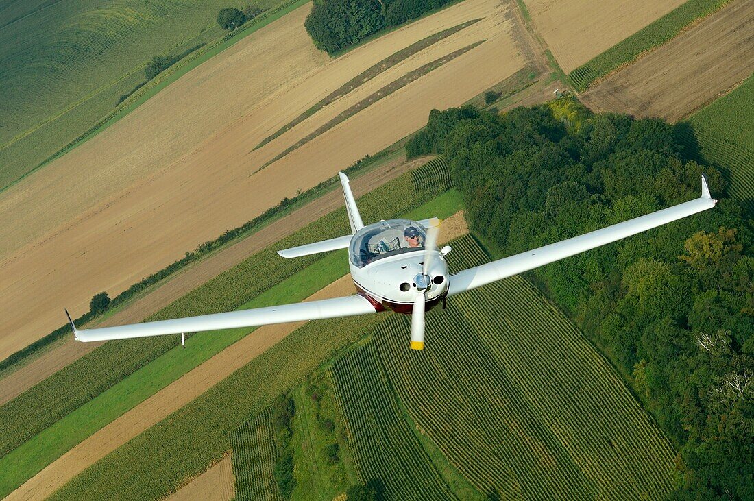 Small sport European LSA Aerospool Dynamic Turbo plane flying over France