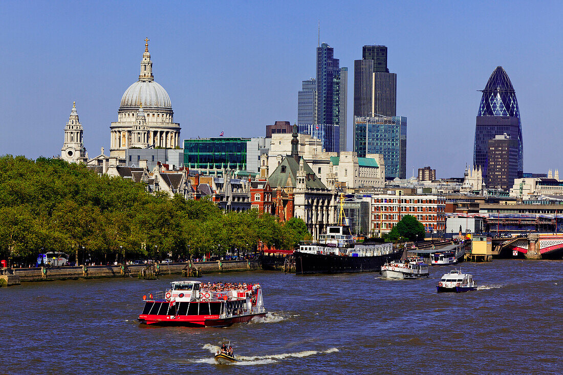 View over the Thames to St. Paul's Cathedral and the office highrisers of the City, London, England, United Kingdom