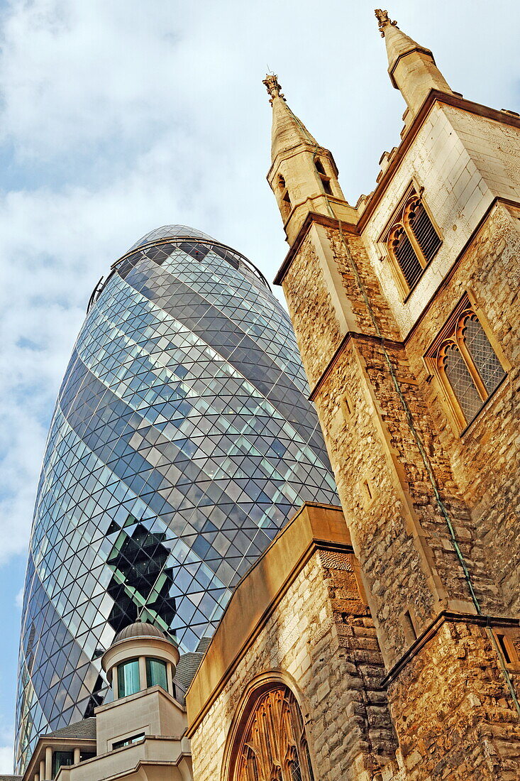 St. Andrew Undershaft and The Gherkin Building, City, London, England, United Kingdom