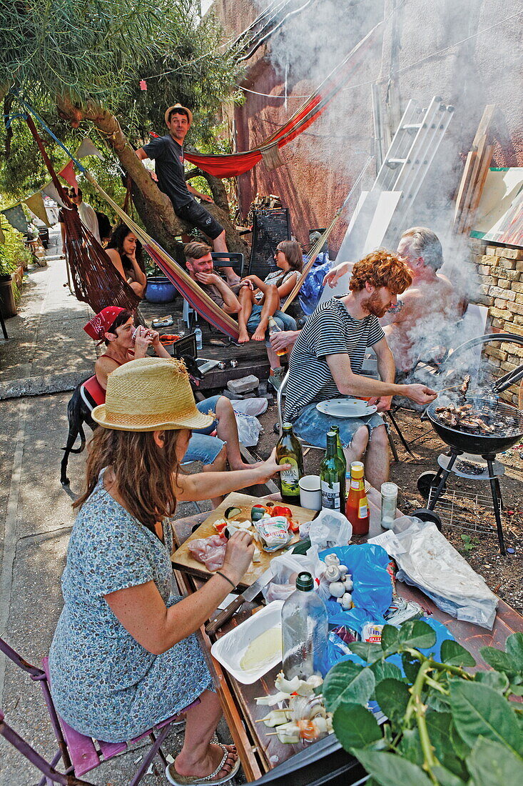 Grill party at a houseboat village on Regent's Canal, Camden, London, England, United Kingdom