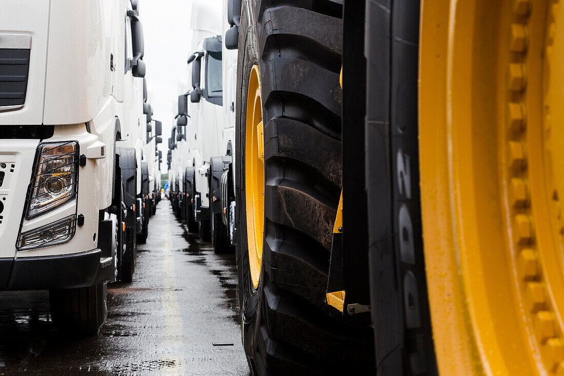 New industrial and construction vehicles in a parking area before shipping, Bremerhafen, Bremen, Germany