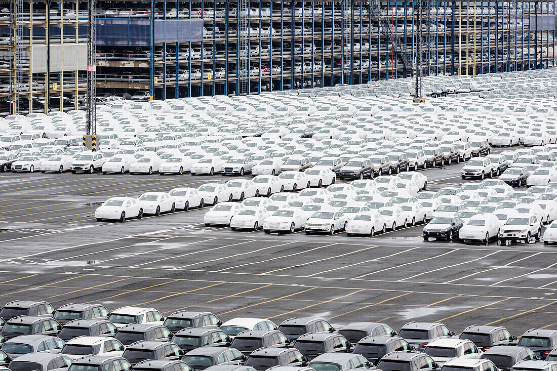 New cars on a parking area awaiting shipping in Bremerhaven, Germany