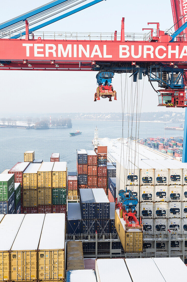 Loading and unloading of the container ship CMA CGM Marco Polo in the Container Terminal Burchardkai,  Hamburg, Germany