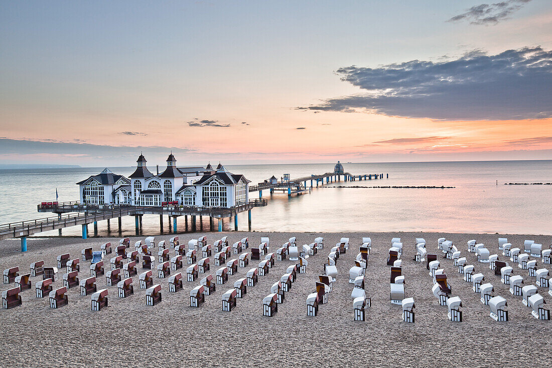 Hooded beach chairs on the beach in the morning light, Sellin, Isle of Ruegen, Baltic Sea, Mecklenburg-Vorpommern, Germany