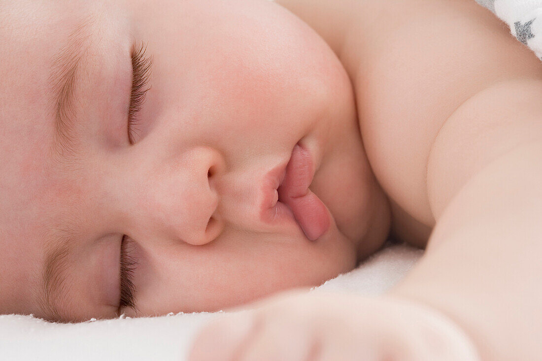 Close up of Hispanic baby boy's sleeping face, New York, New York, USA