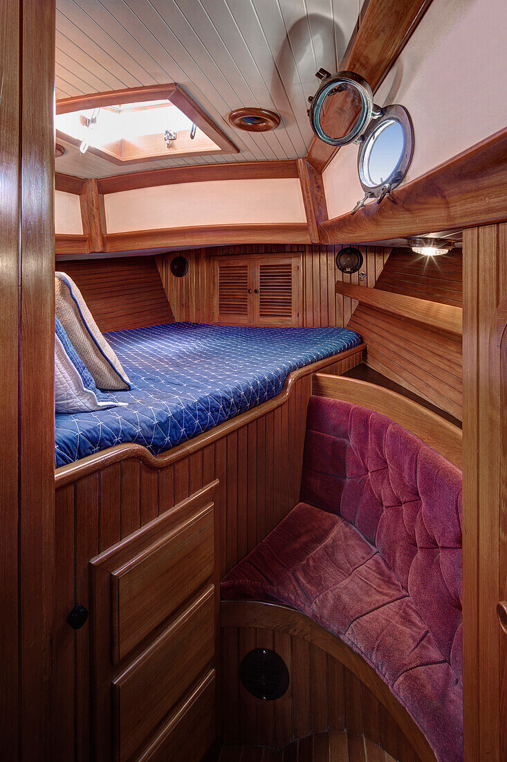 Sleeper in boat cabin, Seattle, Washington, USA