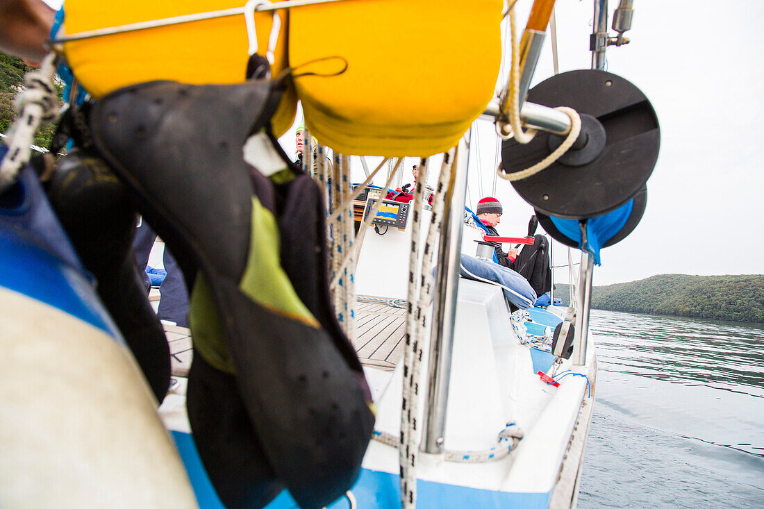Climbing shoes on a sailing boat, Lim canal, Istria, Croatia