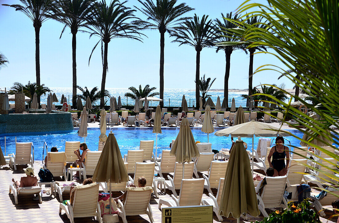 Guests at a hotel pool, Corralejo, La Oliva, Fuerteventura, Canary Islands, Spain