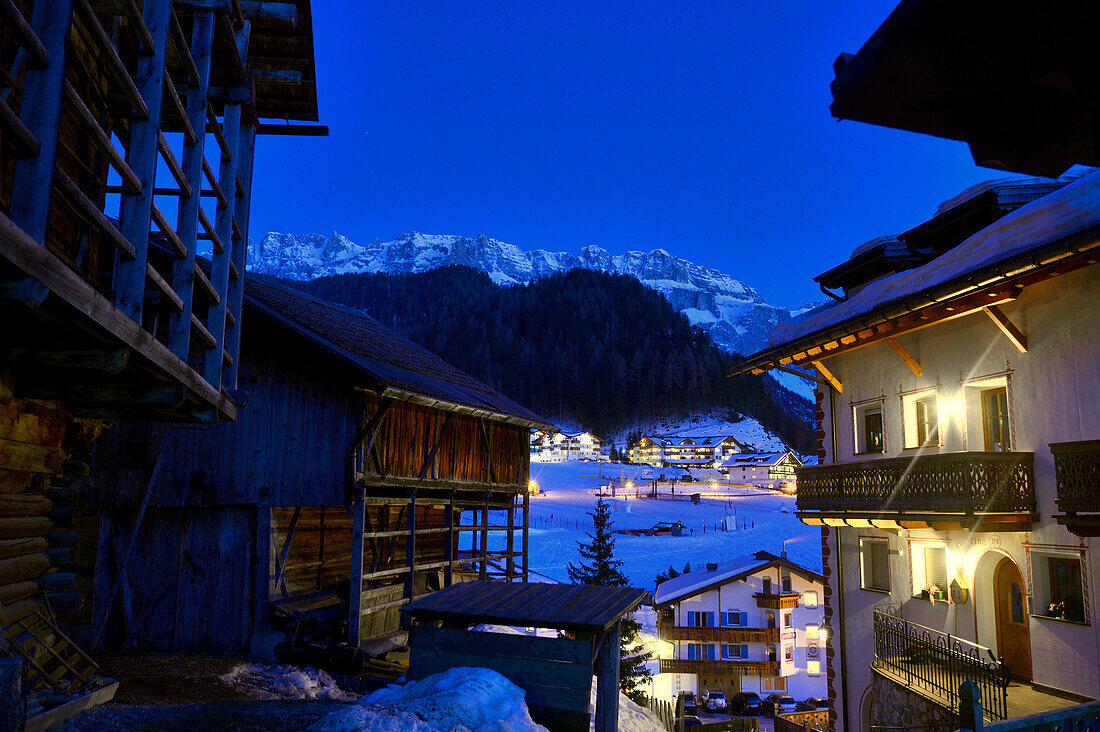 Wolkenstein in the evening, Groedner valley in winter, South Tyrol, Italy