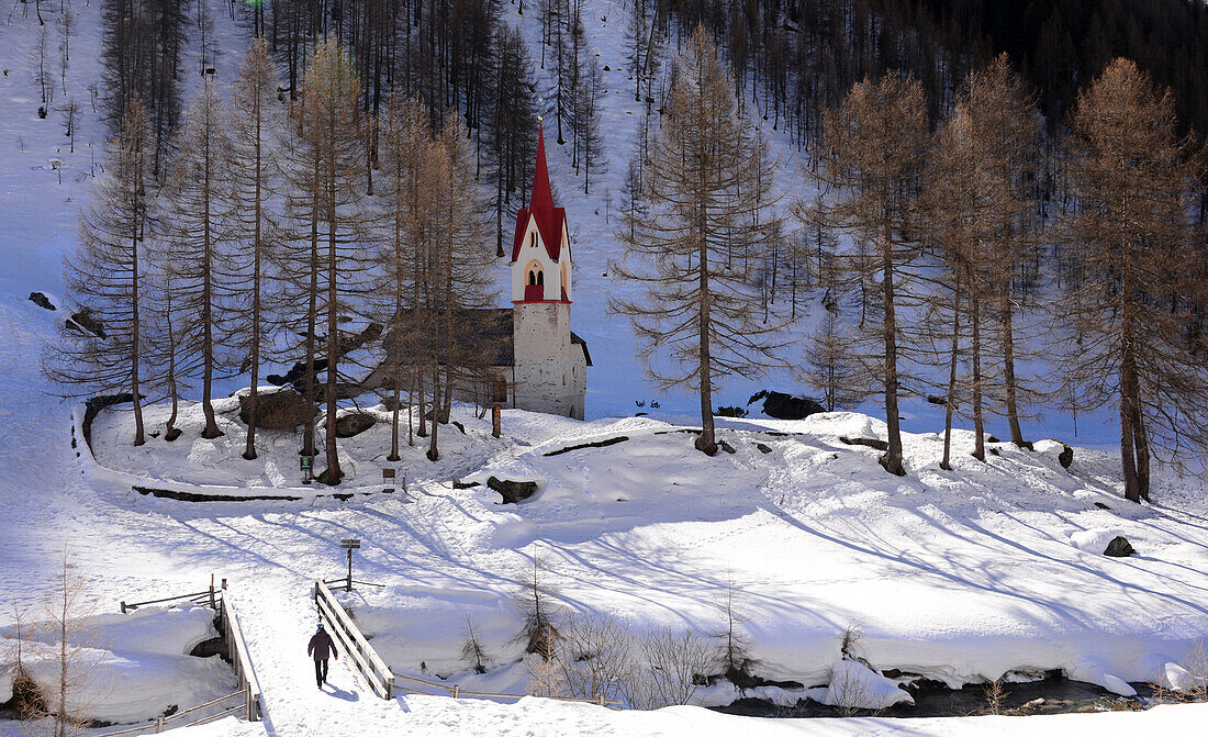 Church near Kasern at the end of the Ahrn valley, South Tyrol in winter, Italy