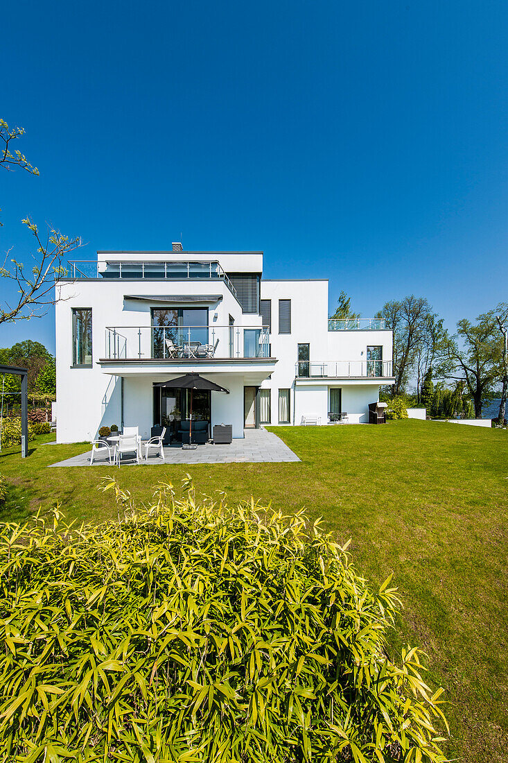 villa in a modern architecture style with water view, Brandenburg, Germany