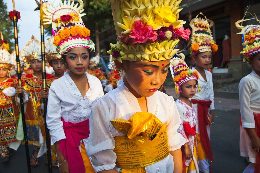 Children dressed for a ceremony. Religious procession. Ubud. Bali. Indonesia. South-East Asia, Asia.