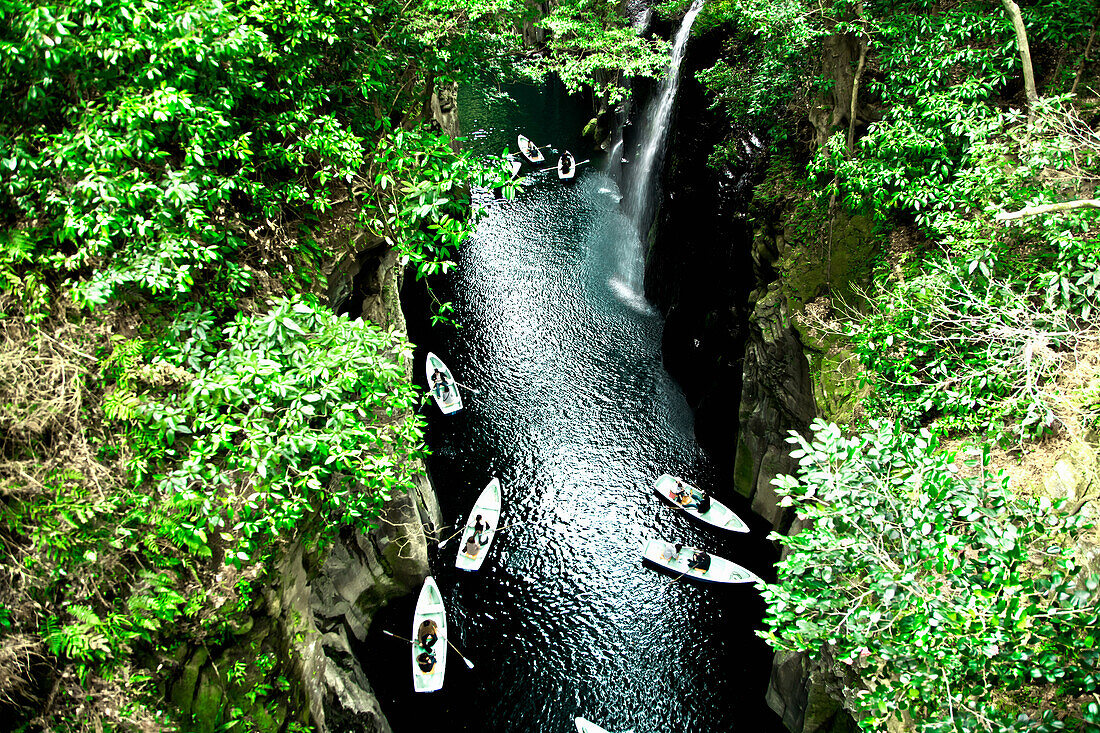 People in boats, Takachiho falls, Miyazaki, Kyushu, Japan