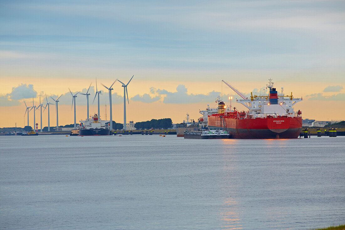 Freighters, wind power station and Europort near Hoek van Holland, Mouth of the river Rhine, Province of Southern Netherlands, South Holland, Netherlands, Europe