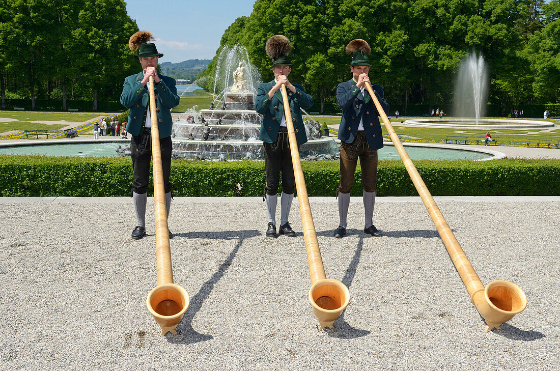 Traditional Bavarian alphorn blowers, Schloss Herrenchiemsee, Chiemsee, Chiemgau, Upper Bavaria, Germany
