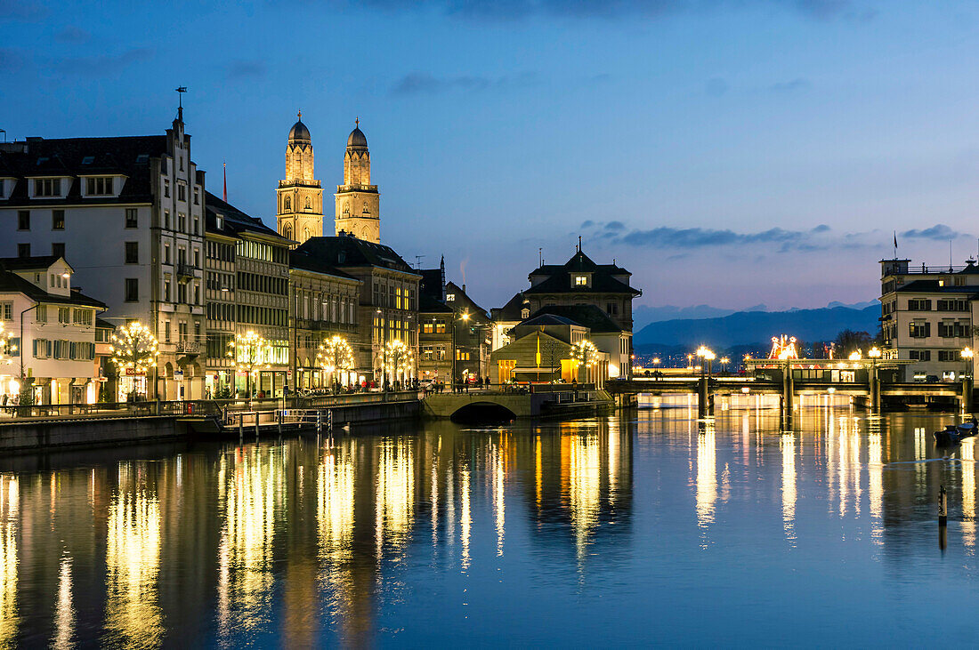 Grossmunster and Limmatquai at twilight, Zurich, Switzerland