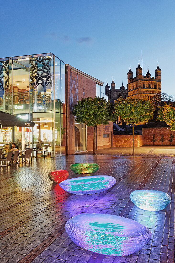 Glass sculptured stones, Princess Haymarket shopping center with Exeter cathedral in the background, Devon, England, Great Britain