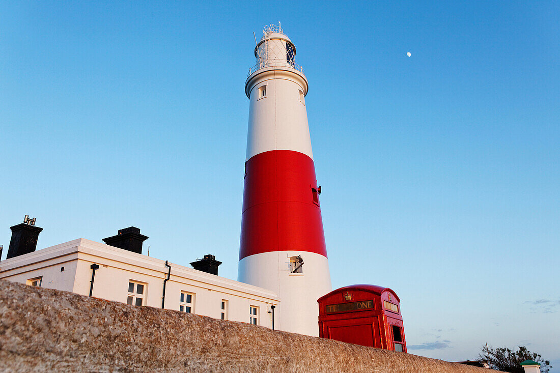 Portland Bill Lighthouse and typical red phone booth, Weymouth, Portland, Dorset, England, Great Britain