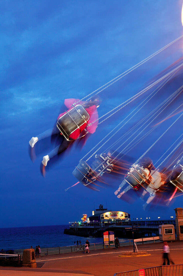 Swing ride and Pier, Bournemouth, Dorset, England, Great Britain