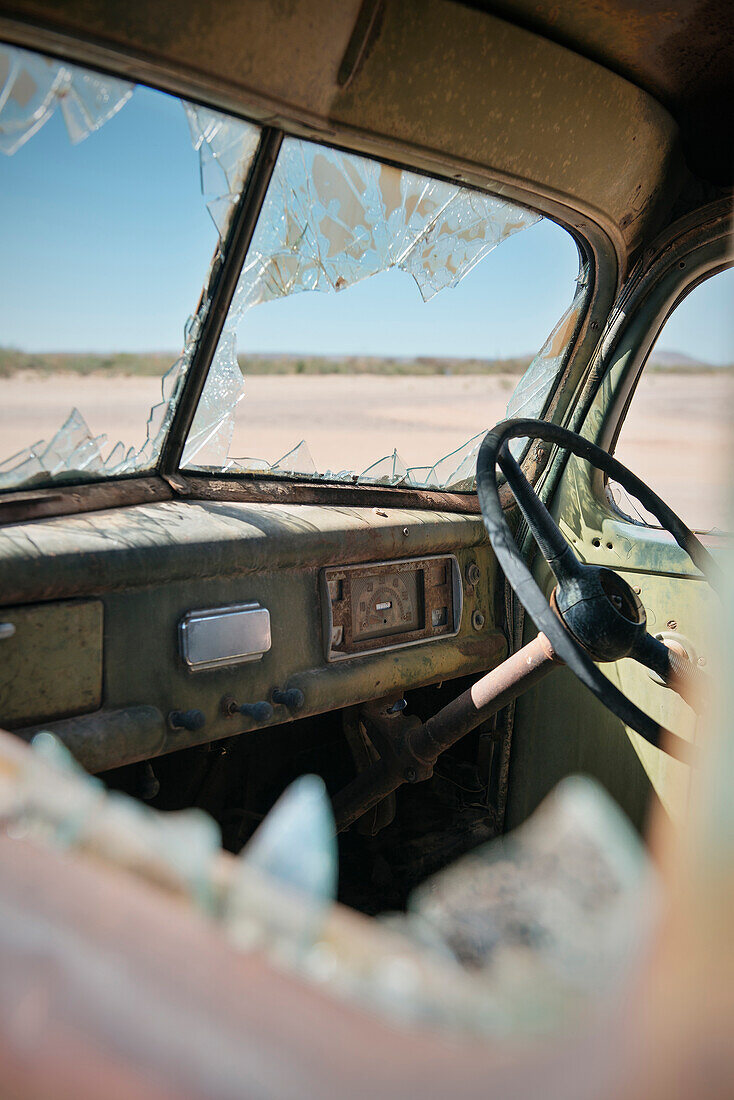 Car wreck at Roadhouse in the desert near Fish River Canyon, Namibia, Africa