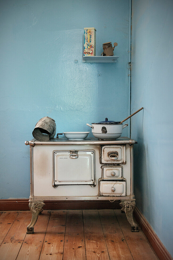 Historical kitchen with cooker in the deserted ghost town in the Diamond restricted area, Kolmanskop near Luderitz, Namibia, Africa