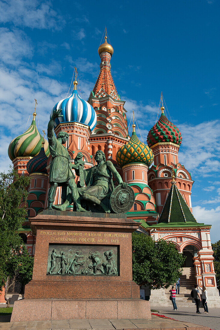 Monument to Minin and Pozharsky in front of Saint Basil's Cathedral on Red Square, Moscow, Russia