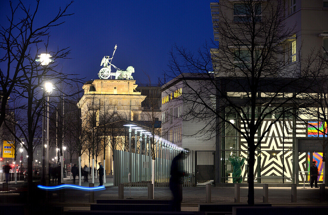 Brandenburg gate and American embassy at night, Berlin, Germany