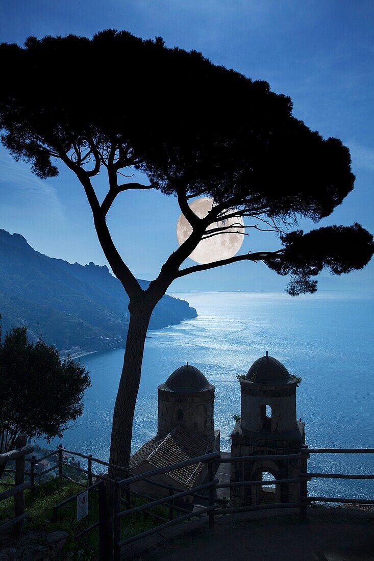 Italy. Campania. Amalfi Peninsula. Ravello. Curch of Ann uinziata and Mediterranean sea view from the gardens of Villa Rufolo.