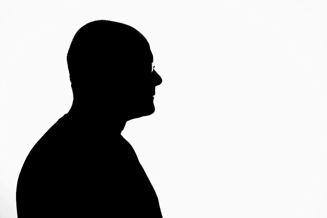 Silhouette of a middle-aged man, head and shoulders