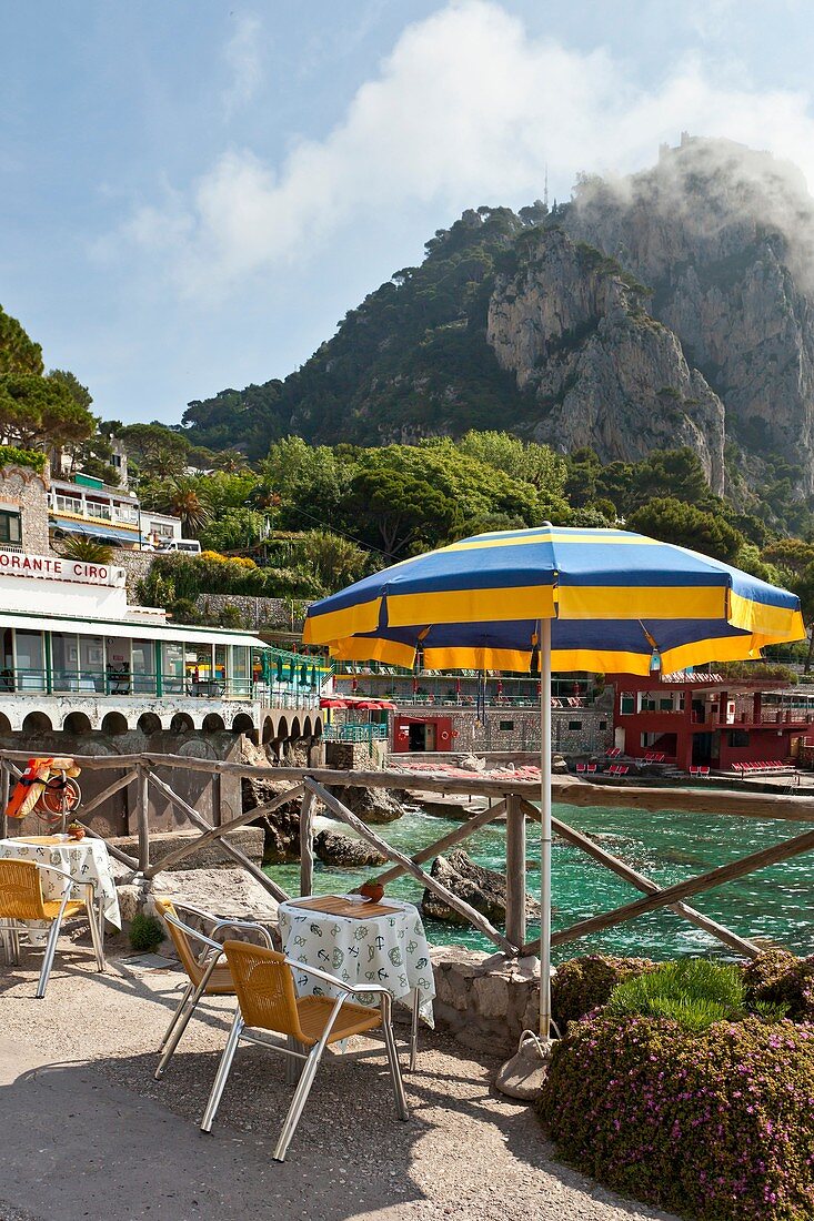 An outdoor restaraunt at the Marina Piccola on the Island of Capri, Campania, Italy