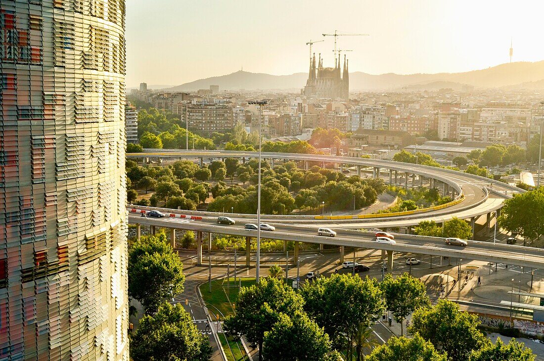 Panoramic of the city from Plaça de les Glòries to Collserola mountain. Agbar tower and Sagrada Familia Church. Barcelona, Catalonia, Spain.