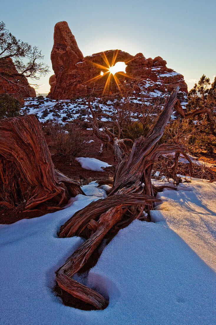The Setting Sun Seen Through Turret Arch, Arches National Park, Utah.