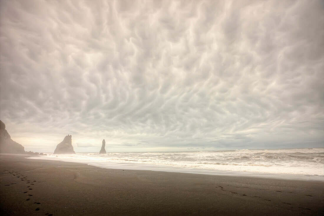 Storm Clouds Over The Ocean And Sea Stacks Near Vik, Southern Iceland