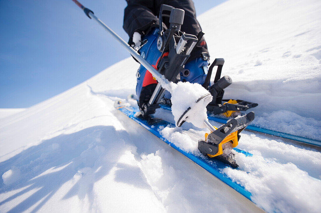 Close Up Of A Backcountry Skiers Ski And Boot In Motion On A Trek Towards Tincan Ridge In The Turnagain Pass Area Of Southcentral Alaska During Winter