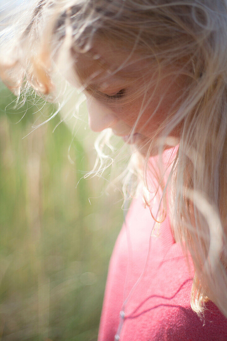 Close up portrait of woman with blonde hair, Wales, UK