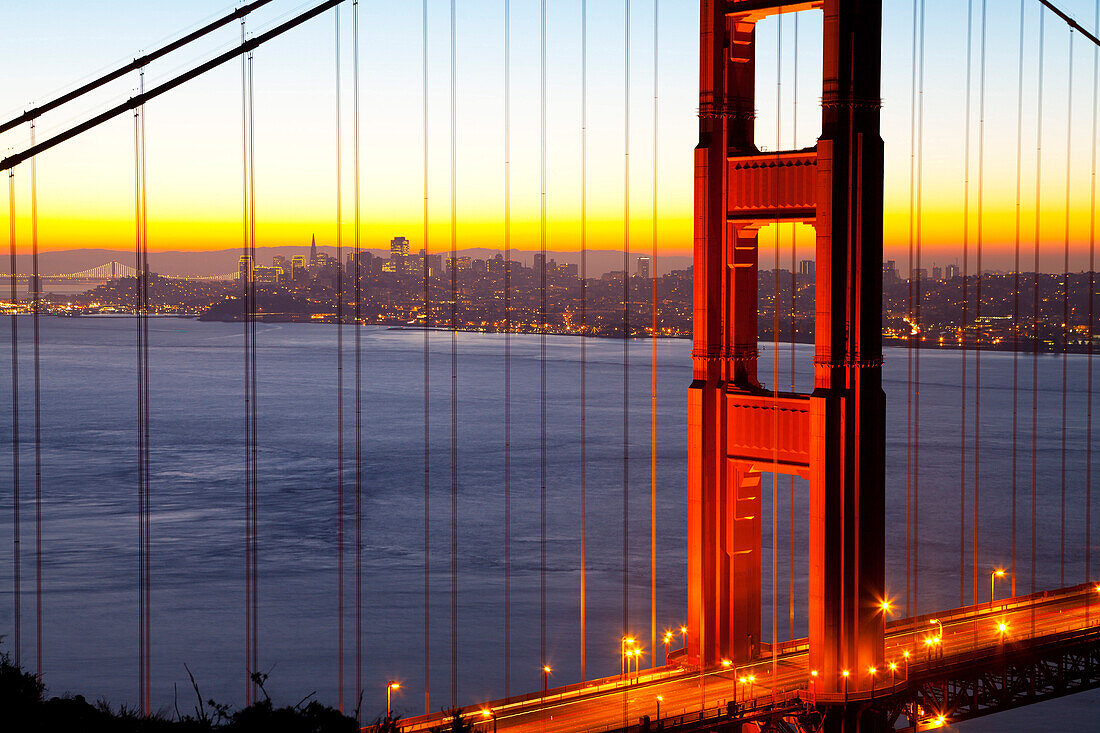 Golden Gate Bridge and San Francisco skyline at dawn, San Francisco, California, United States of America, North America