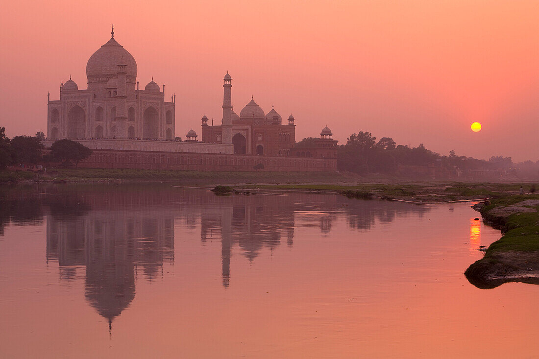 Taj Mahal reflected in the Yamuna River at sunset, UNESCO World Heritage Site, Agra, Uttar Pradesh, India, Asia
