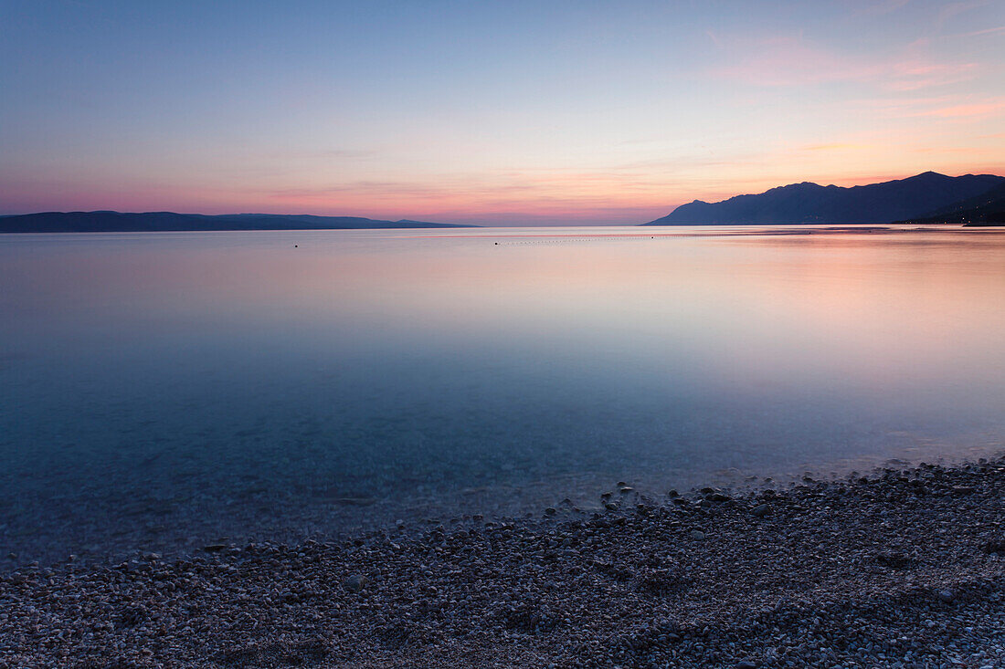 Sunset at the beach of Baska Voda, Makarska Riviera, Dalmatia, Croatia, Europe