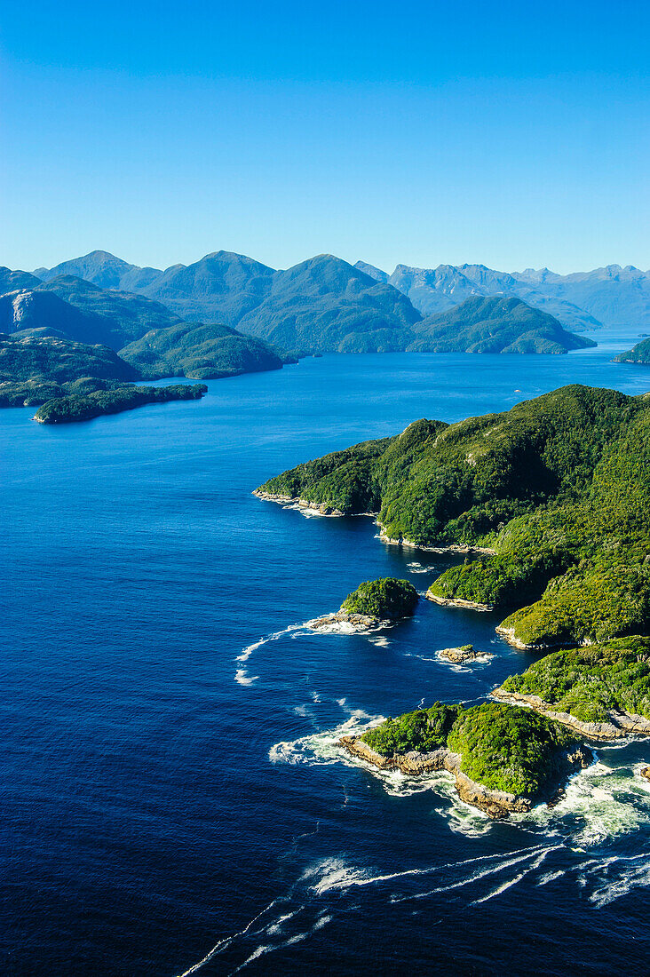 Aerial of a huge fjord in Fiordland National Park, UNESCO World Heritage Site, South Island, New Zealand, Pacific