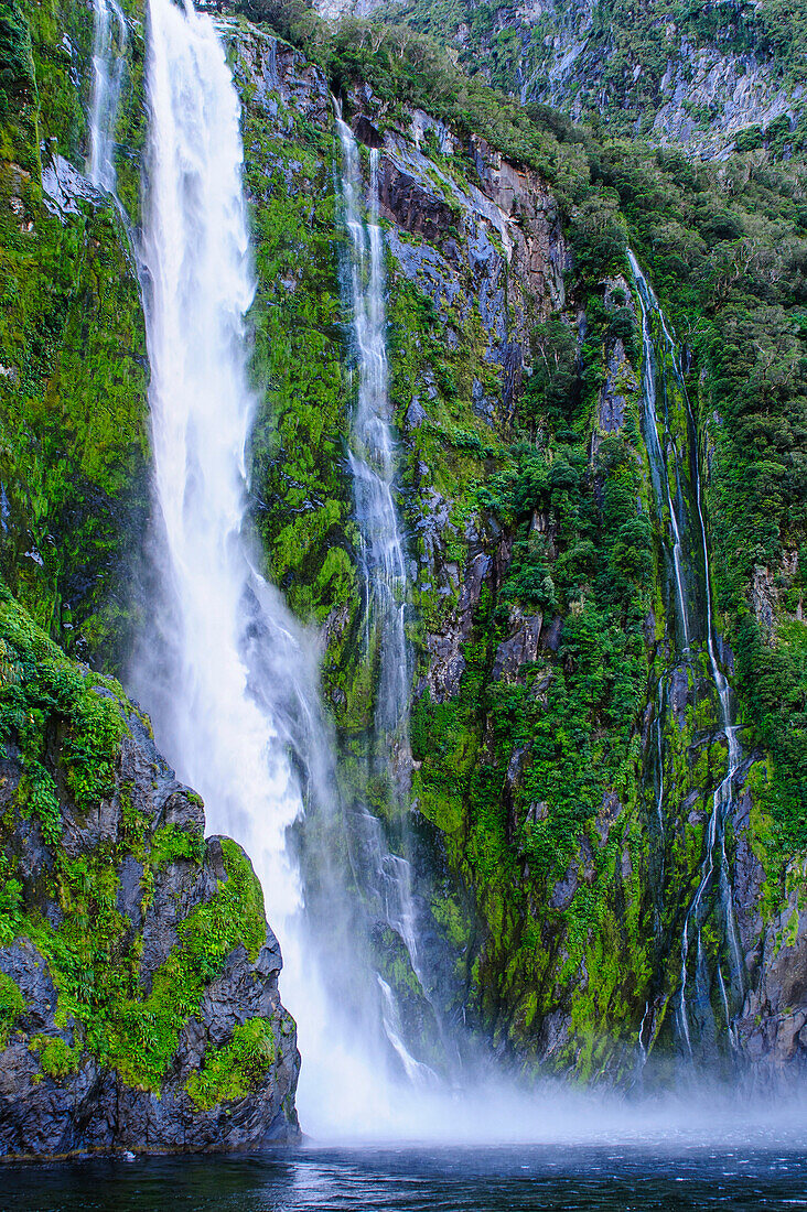 Huge waterfall in Milford Sound, Fiordland National Park, UNESCO World Heritage Site, South Island, New Zealand, Pacific