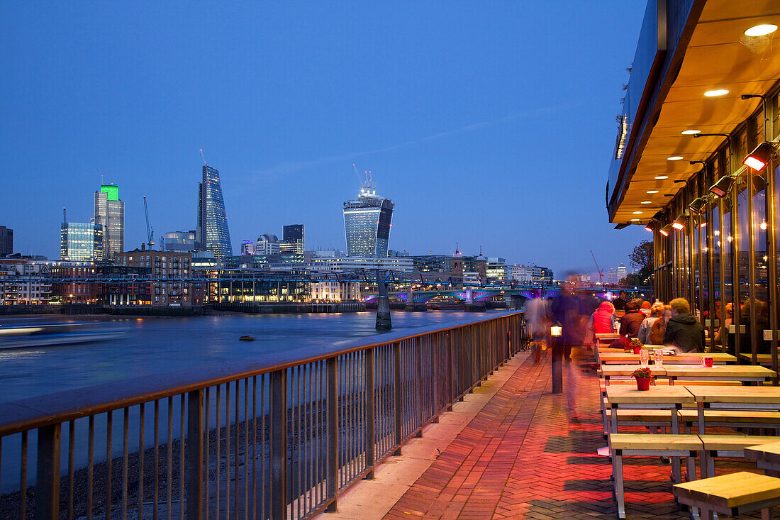River Thames and City of London skyline at dusk, London, England, United Kingdom, Europe