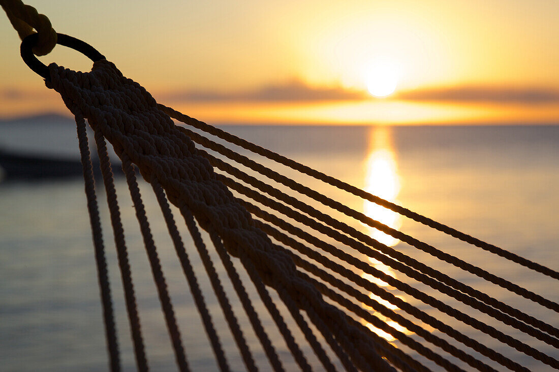 Hammock and beach at sunset, Morris Bay, St. Mary, Antigua, Leeward Islands, West Indies, Caribbean, Central America