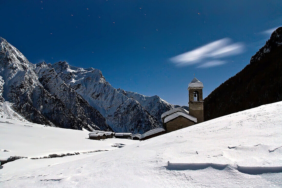 Night photography by moonlight at San Bernardo's church, Val Rezzalo, high Valtellina, Lombardy