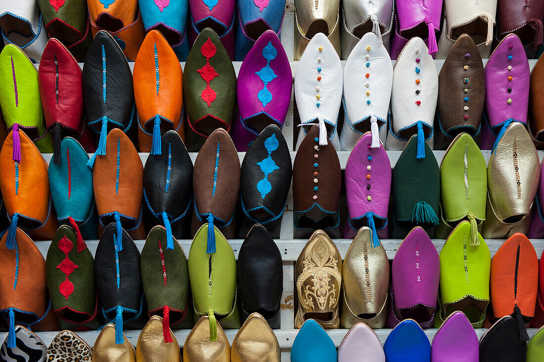 Colorful rows of leather shoes in a shop on the babouche suk of Marrakech, Morocco