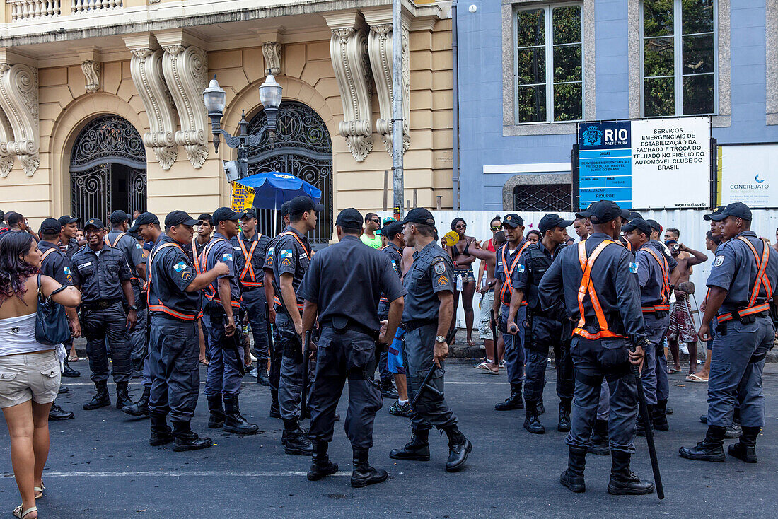 Brazil, Rio de Janeiro, policemen in the street during the carnival