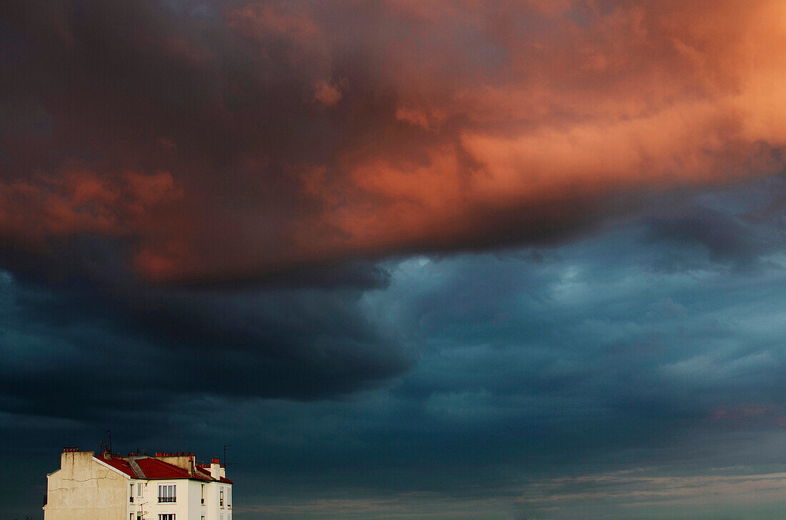 Cloudy sky above an isolated house, Rosny-sous-bois, Seine-Saint-Denis, France